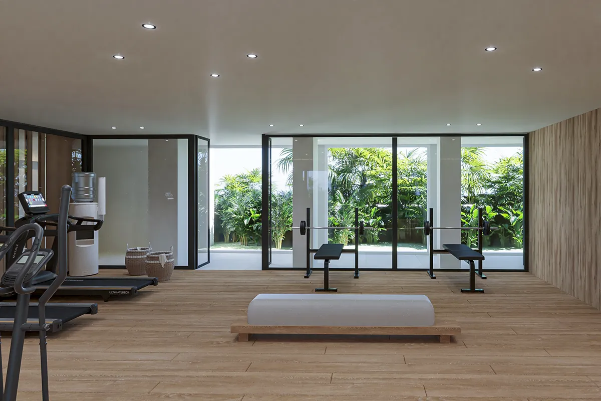 Sala de gimnasio con salida a terraza exterior del Fergus Style Palma Beach