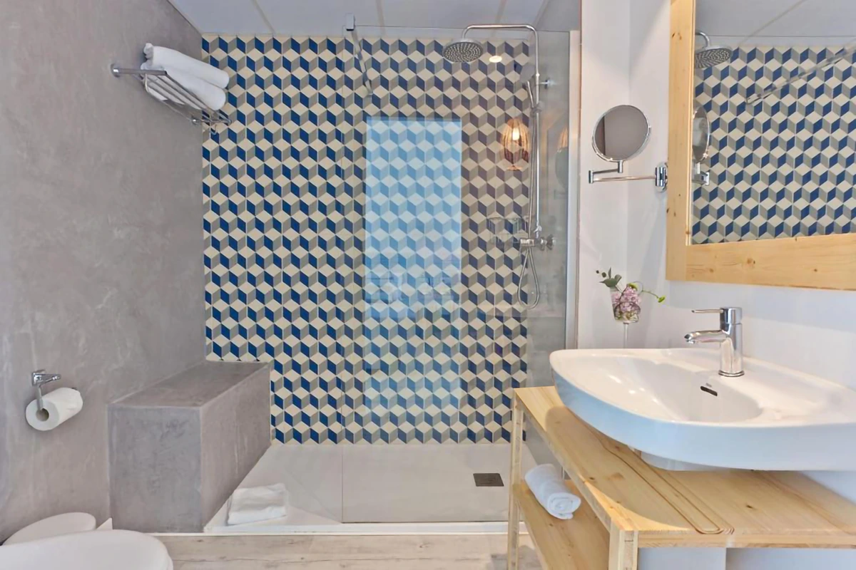 Cuarto de baño de la habitación Cuadruple Deluxe Cuarto de baño de la habitación Cuadruple Deluxe Hotel Fergus Club Pineda Splash