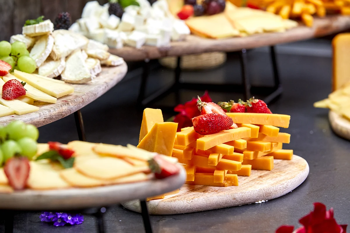 Buffet with cheese boards Cheese variety at buffet restaurant Fergus Conil Fergus Hotels