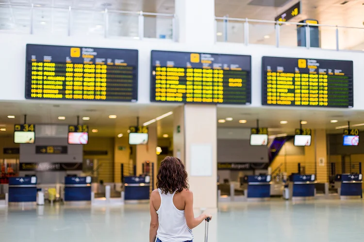 Woman at the airport Fergus Hotels